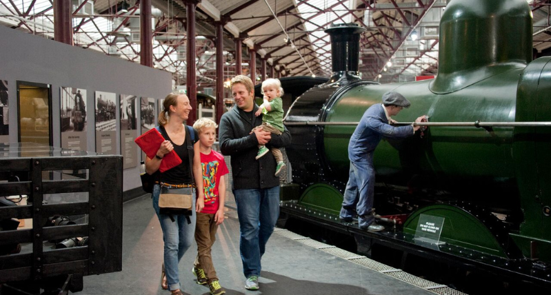 Family walking through STEAM Museum